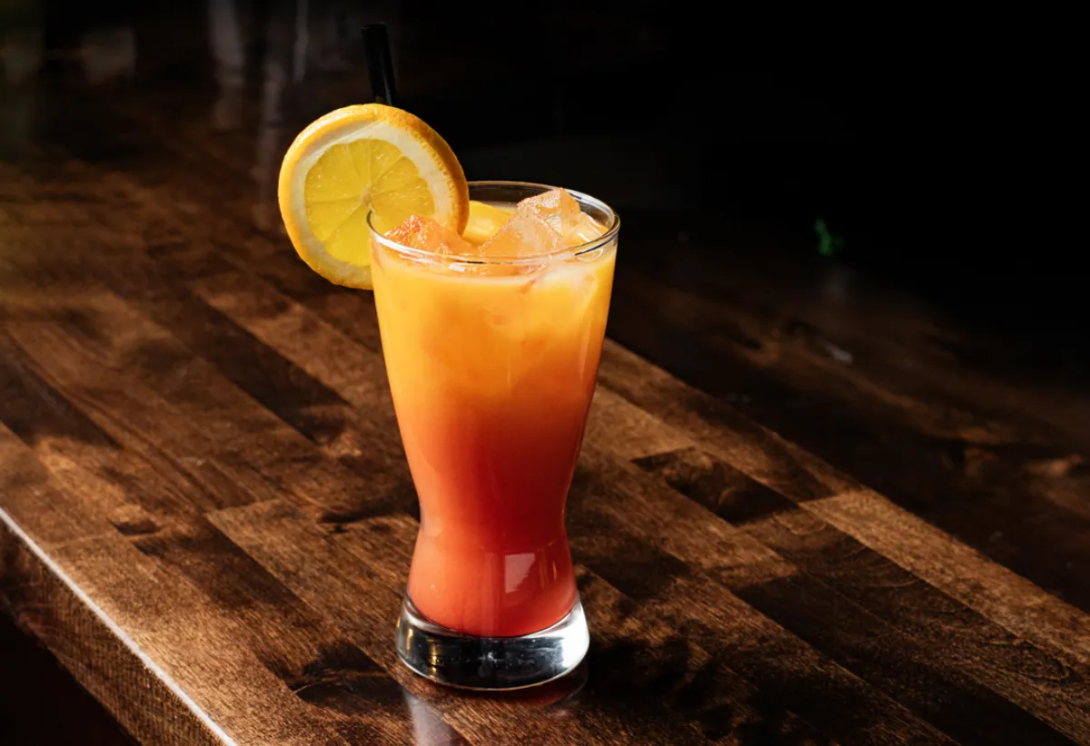 Tequila Sunrise cocktail Happy Hour special at The Foodie Club Grand Canyon Village