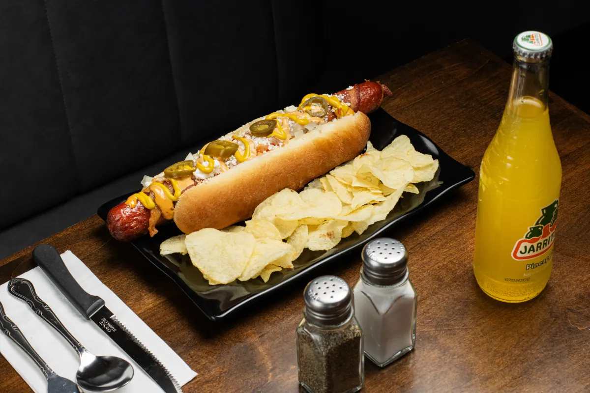 Hot dog with Mexican toppings at The Foodie Club Tusayan